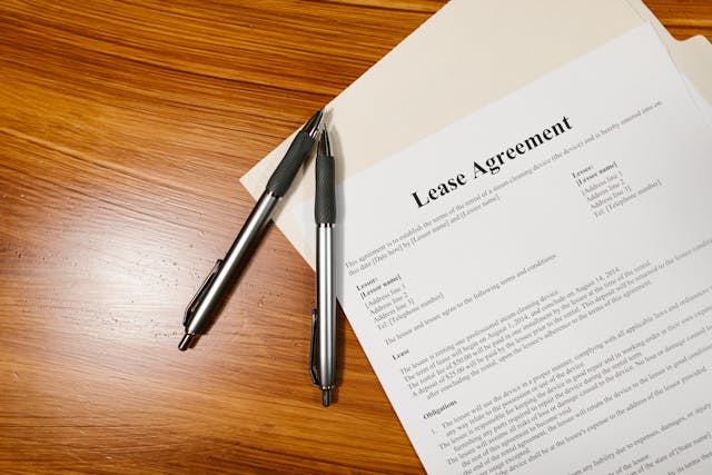 A lease agreement with two pens